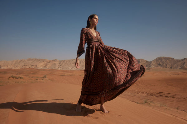 a woman in a desert