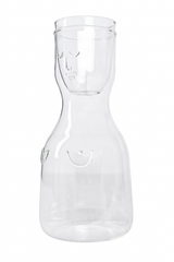 Clear glass carafe with a cup on a white background
