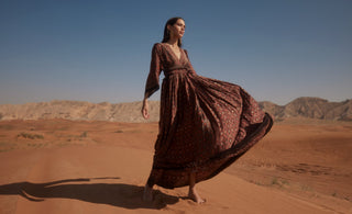a woman in a desert