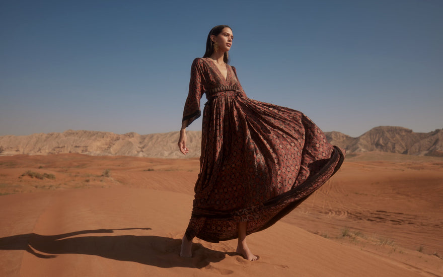 a woman in a desert