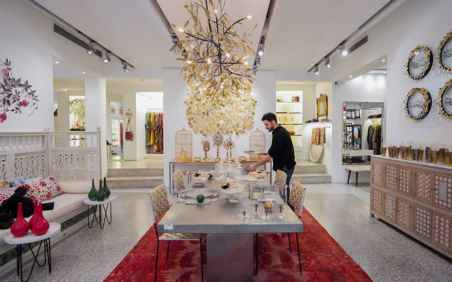 a man is setting a table