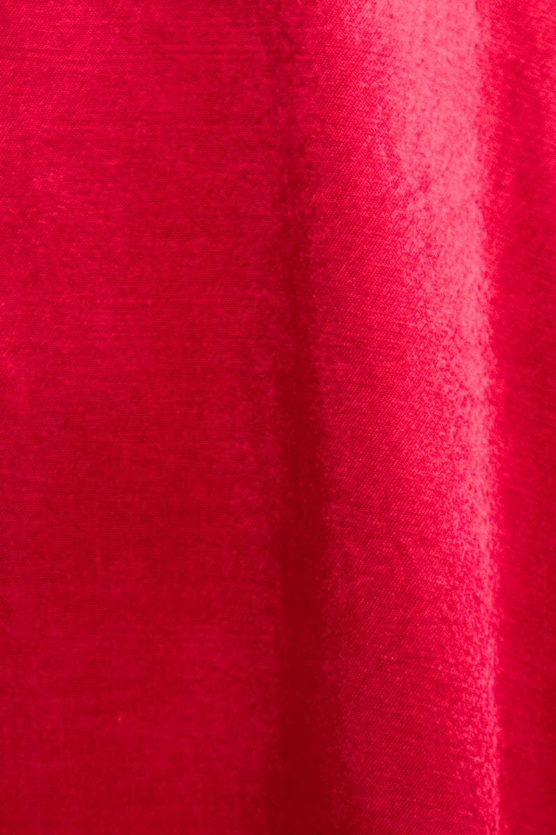 Close-up of a bright pink fabric texture